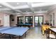 Game room with ping pong, foosball, and pool table at 8636 Tenbridge Way, New Port Richey, FL 34654