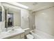 Clean bathroom with a bathtub, toilet and vanity at 8833 Manos Cir # 8833, New Port Richey, FL 34655
