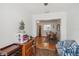 Living room with view into dining area at 8833 Manos Cir # 8833, New Port Richey, FL 34655