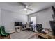 Bedroom with a workspace setup and hardwood floors at 7325 Millstone St, Spring Hill, FL 34606