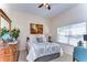 Cozy bedroom with a comfortable bed and plenty of natural light at 8704 Cypress Lakes Blvd, New Port Richey, FL 34653