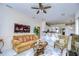 Comfortable living room with a view into the kitchen and access to other rooms at 8704 Cypress Lakes Blvd, New Port Richey, FL 34653