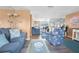Open concept living and dining area with view to kitchen at 10316 Amadeus Dr, Port Richey, FL 34668