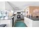 Modern kitchen boasts stainless steel appliances and granite countertops at 10316 Amadeus Dr, Port Richey, FL 34668