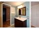 Clean bathroom with vanity, mirror, and shower at 15473 Darien Way, Clearwater, FL 33764