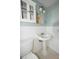 Clean bathroom with pedestal sink and medicine cabinet at 15473 Darien Way, Clearwater, FL 33764