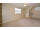 Spacious bedroom with window, ceiling fan, and built-in shelves at 15473 Darien Way, Clearwater, FL 33764
