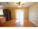 Dining area with hardwood floors and sliding glass doors at 15473 Darien Way, Clearwater, FL 33764