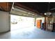 Two-car garage with storage cabinets and opener at 15473 Darien Way, Clearwater, FL 33764