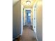 Clean and bright hallway with parquet flooring at 15473 Darien Way, Clearwater, FL 33764