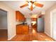 Kitchen with wood cabinets, granite countertops, and stainless steel appliances at 15473 Darien Way, Clearwater, FL 33764