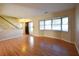 Spacious living area with hardwood floors and built-in shelving at 15473 Darien Way, Clearwater, FL 33764