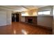Main bedroom with fireplace, hardwood floors and walk-in closet at 15473 Darien Way, Clearwater, FL 33764