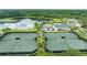 Tennis courts near clubhouse and pool area at 6392 Summit View Dr, Brooksville, FL 34601