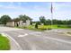 Ornate entrance to Southern Hills community with flagpole at 6392 Summit View Dr, Brooksville, FL 34601