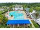 Large community pool with ample seating and a covered area at 6392 Summit View Dr, Brooksville, FL 34601