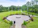 Circular sitting area with benches and flags at 6392 Summit View Dr, Brooksville, FL 34601