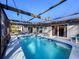 Inviting screened pool area, perfect for relaxation and entertaining at 7310 Rockwood Dr, Port Richey, FL 34668