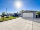 Single-Gathering home with driveway and attached garage at 7310 Rockwood Dr, Port Richey, FL 34668