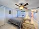 Bedroom with a double bed and ceiling fan at 7310 Rockwood Dr, Port Richey, FL 34668