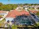 Aerial view showcasing the home's layout and pool at 7310 Rockwood Dr, Port Richey, FL 34668