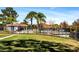 Community pool with fenced-in area at 7719 Cosme Dr # 1, Hudson, FL 34667