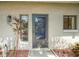 Condo unit entrance with a screen door and window at 7719 Cosme Dr # 1, Hudson, FL 34667