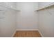 Large walk-in closet with wire shelving, providing ample storage space at 7719 Cosme Dr # 1, Hudson, FL 34667