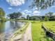Serene pond view adjacent to condo community at 7719 Cosme Dr # 1, Hudson, FL 34667
