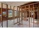 Under construction interior, featuring open floor plan and large windows at 9305 Kiowa Dr, New Port Richey, FL 34654