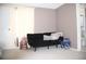 Small bedroom with a sofa bed and access to a bathroom at 7204 Westcott Dr, Port Richey, FL 34668