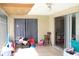 Bright screened patio with sliding doors and tiled floor at 7204 Westcott Dr, Port Richey, FL 34668