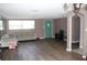 Spacious living room with laminate flooring at 7204 Westcott Dr, Port Richey, FL 34668