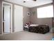 Cozy bedroom with a single bed and access to a bathroom at 7204 Westcott Dr, Port Richey, FL 34668
