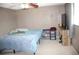 Primary bedroom with a queen bed and TV stand at 7204 Westcott Dr, Port Richey, FL 34668