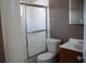 Clean bathroom with a shower/tub combo and vanity at 7204 Westcott Dr, Port Richey, FL 34668