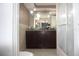 Bathroom with double vanity and shower at 7204 Westcott Dr, Port Richey, FL 34668