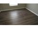 Wood-look flooring in bedroom at 18516 Avocet Dr, Lutz, FL 33558