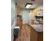 Clean and functional kitchen with ample counter space and cabinets at 7486 Heather Walk Dr # 31, Weeki Wachee, FL 34613