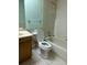 Clean bathroom with a bathtub, toilet and vanity at 7486 Heather Walk Dr # 31, Weeki Wachee, FL 34613