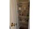 Well-organized linen closet with wire shelving; ample storage at 7486 Heather Walk Dr # 31, Weeki Wachee, FL 34613