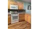 Well-equipped kitchen with light wood cabinets and modern appliances at 7486 Heather Walk Dr # 31, Weeki Wachee, FL 34613