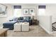 Relaxing game room features a sectional sofa, ottomans, and natural light at 10421 High Noon Trl, Parrish, FL 34219