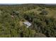 Single story home nestled in a wooded area at 13080 Old Crystal River Rd, Brooksville, FL 34601