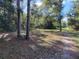Wooded area with a dirt path and small fence at 13080 Old Crystal River Rd, Brooksville, FL 34601