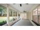 Spacious screened porch overlooking a private backyard at 13080 Old Crystal River Rd, Brooksville, FL 34601