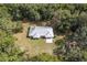 Single-story home with metal roof and large yard at 13080 Old Crystal River Rd, Brooksville, FL 34601
