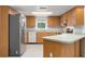 Well-equipped kitchen with ample cabinetry and stainless steel appliances at 13080 Old Crystal River Rd, Brooksville, FL 34601