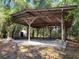 Open-air carport with a concrete floor at 13080 Old Crystal River Rd, Brooksville, FL 34601