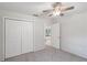 Bedroom with double door closet and access to another room at 13080 Old Crystal River Rd, Brooksville, FL 34601